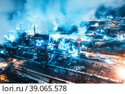 Aerial view of steel plant at night with smokestacks and fire blazing out of the pipe. Industrial panoramic landmark with blast furnance of metallurgical production. Concept of environmental pollution. Стоковое фото, фотограф Евгений Ткачёв / Фотобанк Лори