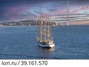 Seascape with a beautiful sailboat on the background of the Russian bridge. Vladivostok, Russia. Стоковое фото, фотограф Виктория Кольцова / Фотобанк Лори