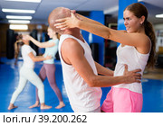 Woman training eye-gouging movement. Стоковое фото, фотограф Яков Филимонов / Фотобанк Лори