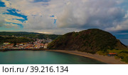 Sunset view to Horta, Porto Pim Bay and beach from mount Guia, Faial island, Azores, Portugal (2015 год). Стоковое фото, фотограф Сергей Майоров / Фотобанк Лори