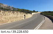 Улица Triq Ghajn Qasab. Надур (Nadur). Остров Гоцо (Gozo). Мальта (2023 год). Стоковое фото, фотограф lana1501 / Фотобанк Лори