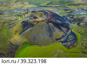 Aerial panoramic views of Grabrok volcano and lava valley from in Iceland. Стоковое фото, фотограф Igor Tichonow / Фотобанк Лори