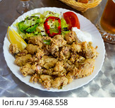 Chipirones battered fried baby squid. Стоковое фото, фотограф Яков Филимонов / Фотобанк Лори