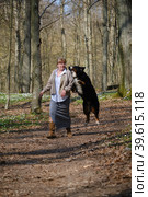 Dog bites woman. Стоковое фото, фотограф Lekcej / Фотобанк Лори