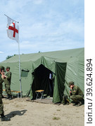 Cadet with radio station at medical tent (2016 год). Редакционное фото, фотограф Сергей Буторин / Фотобанк Лори