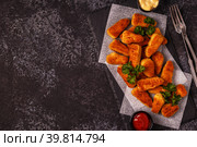 Chicken naggets with sauces on dark background. Стоковое фото, фотограф Татьяна  Бральнина / Фотобанк Лори