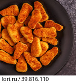 Chicken naggets with sauces on dark background. Стоковое фото, фотограф Татьяна  Бральнина / Фотобанк Лори