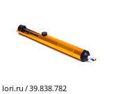 Yellow metal desoldering pump isolated on white background. Стоковое фото, фотограф Аксенова Вера / Фотобанк Лори