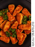 Chicken naggets with sauces on dark background. Стоковое фото, фотограф Татьяна  Бральнина / Фотобанк Лори