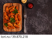 Chicken naggets with sauces on dark background. Стоковое фото, фотограф Татьяна  Бральнина / Фотобанк Лори