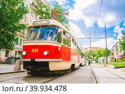 Moscow. Russia. 06.04.2022. Tram parade. Трамвай ЧКД Татра Т3 Tatra T3 SU.  Маршрут "Останкино - детский санаторий". The view from below. Wide angle . Парад ретротрамваев. Редакционное фото, фотограф Тамара Сахарова / Фотобанк Лори