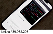 developer writing code for an AI chatbot powered by GPT technology, using programming languages such as Python and Java to enhance its capabilities. Стоковое видео, видеограф Mihail Mihaylov / Фотобанк Лори