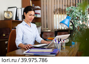 Portrait of young woman working at office. Стоковое фото, фотограф Яков Филимонов / Фотобанк Лори