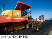 Kyzylorda province, Kazakhstan, April 29, 2012: Construction of West Europe-West China new highway. Dynapac and Hamm road machines. Стоковое фото, фотограф Alexey Rezvykh / Фотобанк Лори
