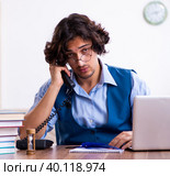 Young writer working on his new work. Стоковое фото, фотограф Elnur / Фотобанк Лори