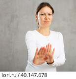 Indifferent woman not agreeing to anything offered to her. Стоковое фото, фотограф Яков Филимонов / Фотобанк Лори
