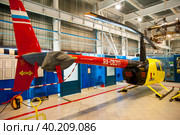 Robinson R44 helicopter during maintencance (2019 год). Редакционное фото, фотограф Сергей Буторин / Фотобанк Лори