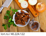 Chopped pickled mushrooms (Lactarius deliciosus) on board. Стоковое фото, фотограф Яков Филимонов / Фотобанк Лори