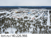 Западная Сибирь, Ханты-Мансийский автономный округ: село Русскинская. Вид с воздуха. Western Siberia, Khanty-Mansi Autonomous Okrug: Russkinskaya village. Aerial view. (2022 год). Стоковое фото, фотограф Евгений Романов / Фотобанк Лори