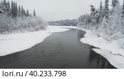 Aerial  flight above Amazing Wild River In Frozen Forest. Really Snowy Winter On The North. Стоковое видео, видеограф Кирилл Трифонов / Фотобанк Лори