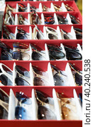 Sunglasses of different shapes and colors on the store counter. Стоковое фото, фотограф Елена Смыкова / Фотобанк Лори