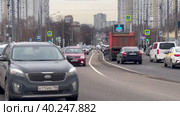 Car traffic on Krasnodonskaya Street in the Volzhskaya metro area in the morning. Pedestrian crossing.  Moscow. 28.03.2023. Редакционное видео, видеограф Ярославский Максим / Фотобанк Лори