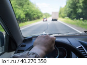 Overtaking a car.A dangerous maneuver on the road.Driving a car. Стоковое фото, фотограф Александр Поташев / Фотобанк Лори