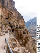 Cave Vardzia city in Georgia, famous tourist place. Стоковое фото, фотограф Яков Филимонов / Фотобанк Лори