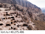 Caves of Vardzia monastery carved into rock, Georgia. Стоковое фото, фотограф Яков Филимонов / Фотобанк Лори