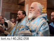 Митрополит Крутицкий и Коломенский Павел и митрополит Иосиф (Масленников) на Благовещение в Троицком храме Реутова (2023 год). Редакционное фото, фотограф Дмитрий Неумоин / Фотобанк Лори