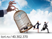 Business people and golden cage concept. Стоковое фото, фотограф Elnur / Фотобанк Лори