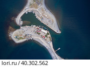 An aerial view of an island with infrastructure in the resort village of Bolshoi Utrish on the Black Sea. Shot from a drone. Стоковое фото, фотограф Роман Дзюбало / Фотобанк Лори