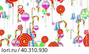 Variety of delicious lollipops on a white background. Стоковая анимация, аниматор WalDeMarus / Фотобанк Лори