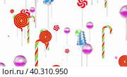 Variety of delicious lollipops on a white background. Стоковая анимация, аниматор WalDeMarus / Фотобанк Лори