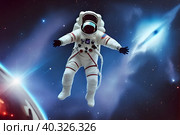 Cosmonaut in outer space. April 12 - Cosmonautics Day. Стоковое AI-изображение, AI-художник Сергей Елизарьев / Фотобанк Лори