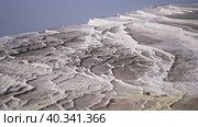 Amazing landscape of Pamukkale thermal springs with cascade of white calcite terraced baths, Turkey. Стоковое видео, видеограф Яков Филимонов / Фотобанк Лори