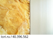 Glass wool - the thermal insulation material under PVC panels. Стоковое фото, фотограф Володина Ольга / Фотобанк Лори