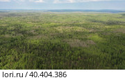 Южный Урал весной, вид на горную тайгу с воздуха. Southern Urals in spring, a view of the mountain taiga from the air. Стоковое видео, видеограф Евгений Романов / Фотобанк Лори