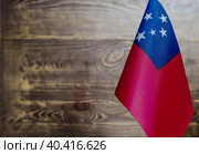Национальный флаг Самоа на деревянном фоне место для текста. Стоковое фото, фотограф Лозовая Людмила / Фотобанк Лори