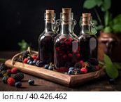 Generative AI illustration of glass bottles with alcoholic tinctures placed on wooden table near plates of assorted ripe fresh berries in kitchen. Стоковое AI-изображение, AI-художник Антон Гвоздиков / Фотобанк Лори