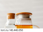 Close up of a glass bottleneck with liquid. Стоковое фото, фотограф Сергей Толмачёв / Фотобанк Лори
