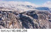 Горный Алтай зимой. Курайский хребет. Вид с воздуха. Altai mountains in winter. Kurai ridge. Aerial view. Стоковое видео, видеограф Евгений Романов / Фотобанк Лори