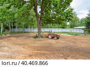 Minitractor on plowed and cultivated land. Стоковое фото, фотограф Юрий Поздников / Фотобанк Лори