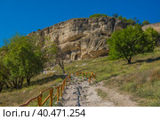The remains of a medieval fortress city (according to other sources - a monastery) Tepe-Kermen, covering the upper part of the mountain in several tiers (2020 год). Стоковое фото, фотограф Анна Кривицкая / Фотобанк Лори