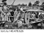 Russia, Staraya Ladoga 23,06,2012 Reenactors with shields and spears during the battle, the festival of historical reconstruction "Pages of History" Стоковое фото, фотограф Анна Кривицкая / Фотобанк Лори