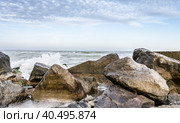Seascape with rocks and surf in the foreground. Стоковое фото, фотограф Артем Курутин / Фотобанк Лори