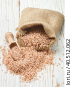 Raw Organic Devzira Rice on a white table. Стоковое фото, фотограф Виктория Панченко / Фотобанк Лори