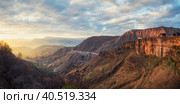 Matlas Valley at sunset in Dagestan. Rocky mountains and the light of the sun in the evening. Стоковое фото, фотограф Саблин Станислав / Фотобанк Лори