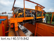 Overhead crane motors and speed reducer closeup photo. Стоковое фото, фотограф Alexey Rezvykh / Фотобанк Лори