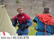 Festival of medieval reconstruction "Russian fortress", Fencing on swords in medieval costumes (2015 год). Редакционное фото, фотограф Анна Кривицкая / Фотобанк Лори